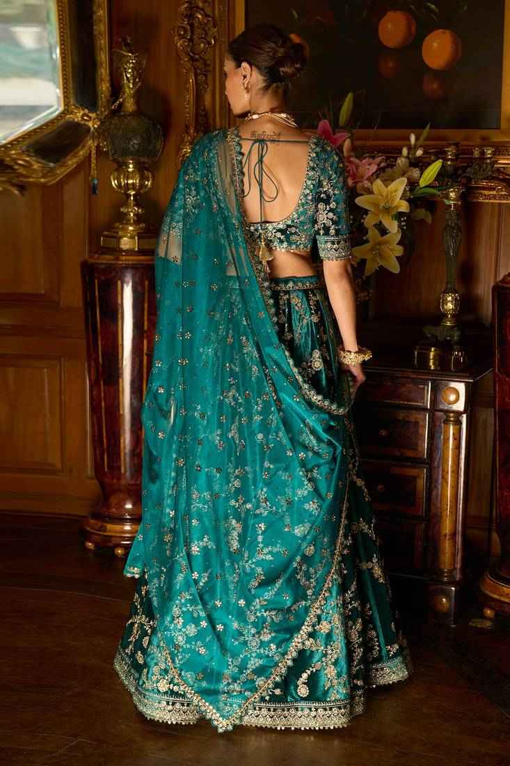 Turquoise Sequins Zari Embroidered Velvet Lehenga