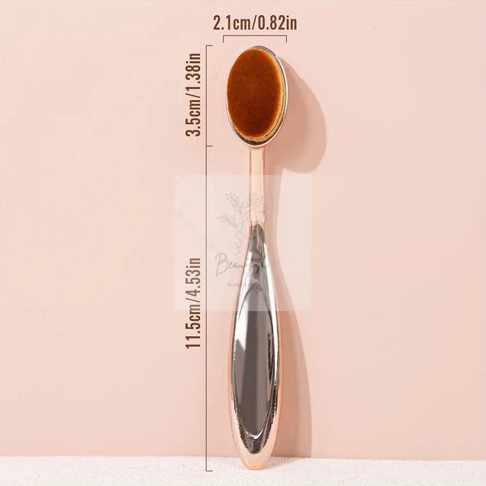 A Set of Three Face Makeup Brushes