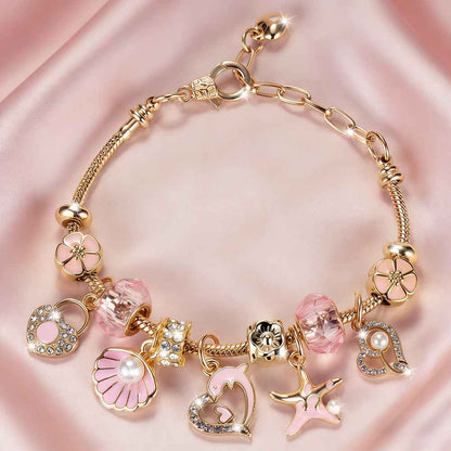 Pink Heart-shaped Stainless Steel Adjustable Women's Bracelet with Dolphin, Seashell, Starfish, and Heart Pendants, Adorned with Flowers and Pink Cadmium Beads