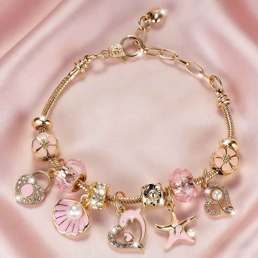 Pink Heart-shaped Stainless Steel Adjustable Women's Bracelet with Dolphin, Seashell, Starfish, and Heart Pendants, Adorned with Flowers and Pink Cadmium Beads