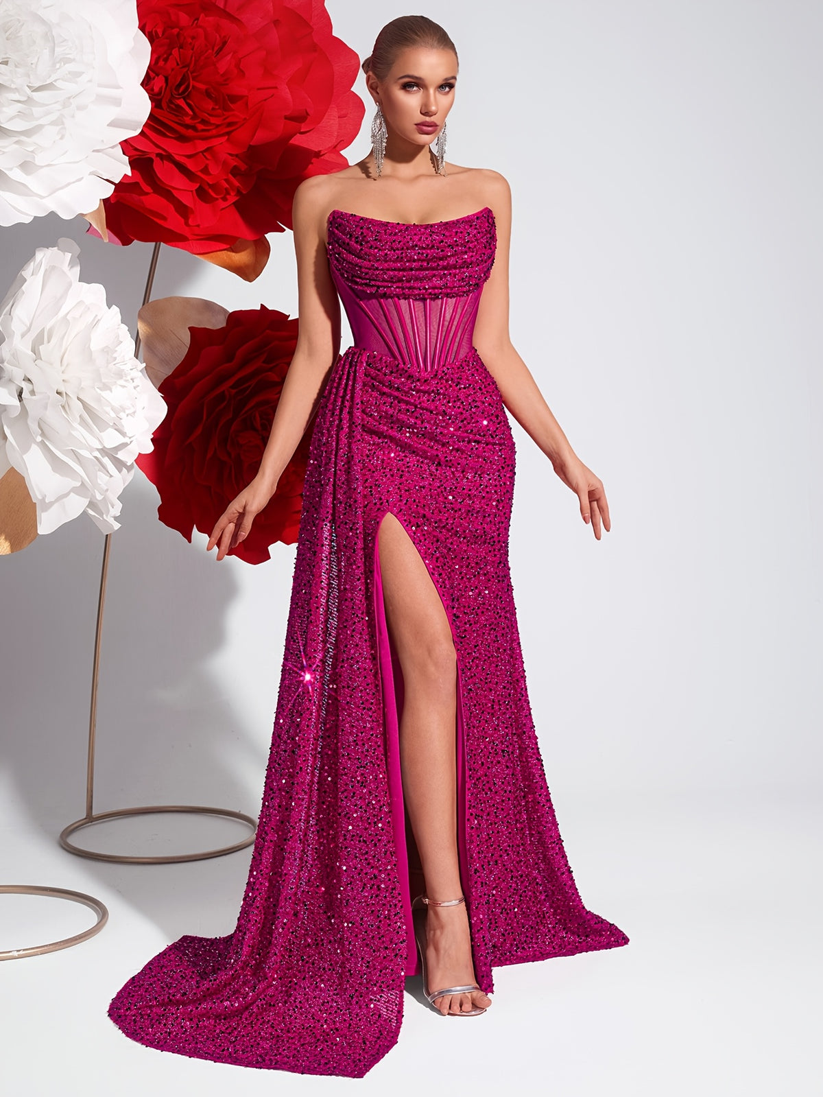 Strapless Sequin Evening Gown with Cut-Out Details and Flowing Ribbons
