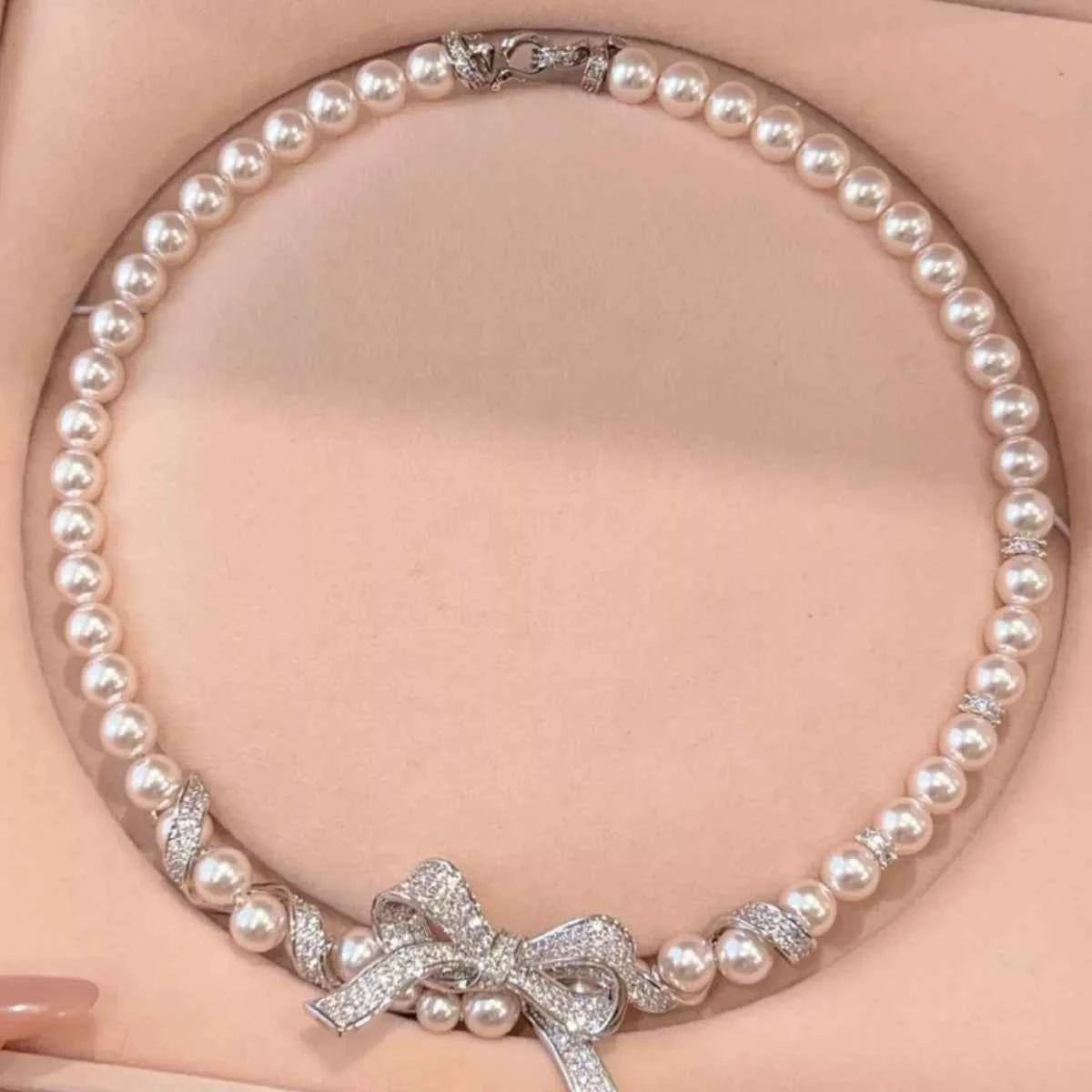 Pearl Necklace with Bow Pendant