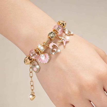 Pink Heart-shaped Stainless Steel Adjustable Women's Bracelet with Dolphin, Seashell, Starfish, and Heart Pendants, Adorned with Flowers and Pink Cadmium Beads