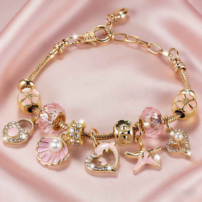 Pink Heart-shaped Stainless Steel Adjustable Women's Bracelet with Dolphin, Seashell, Starfish, and Heart Pendants, Adorned with Flowers and Pink Cadmium Beads