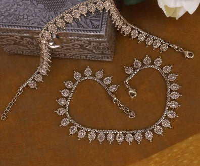 Traditional oval and flower design gold plated