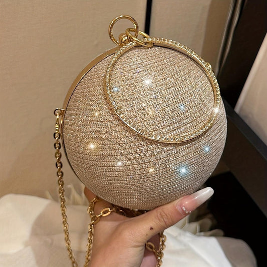 A Classic Evening Handbag  Featuring a Small And Shiny Round Design