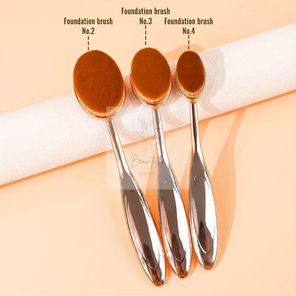 A Set of Three Face Makeup Brushes