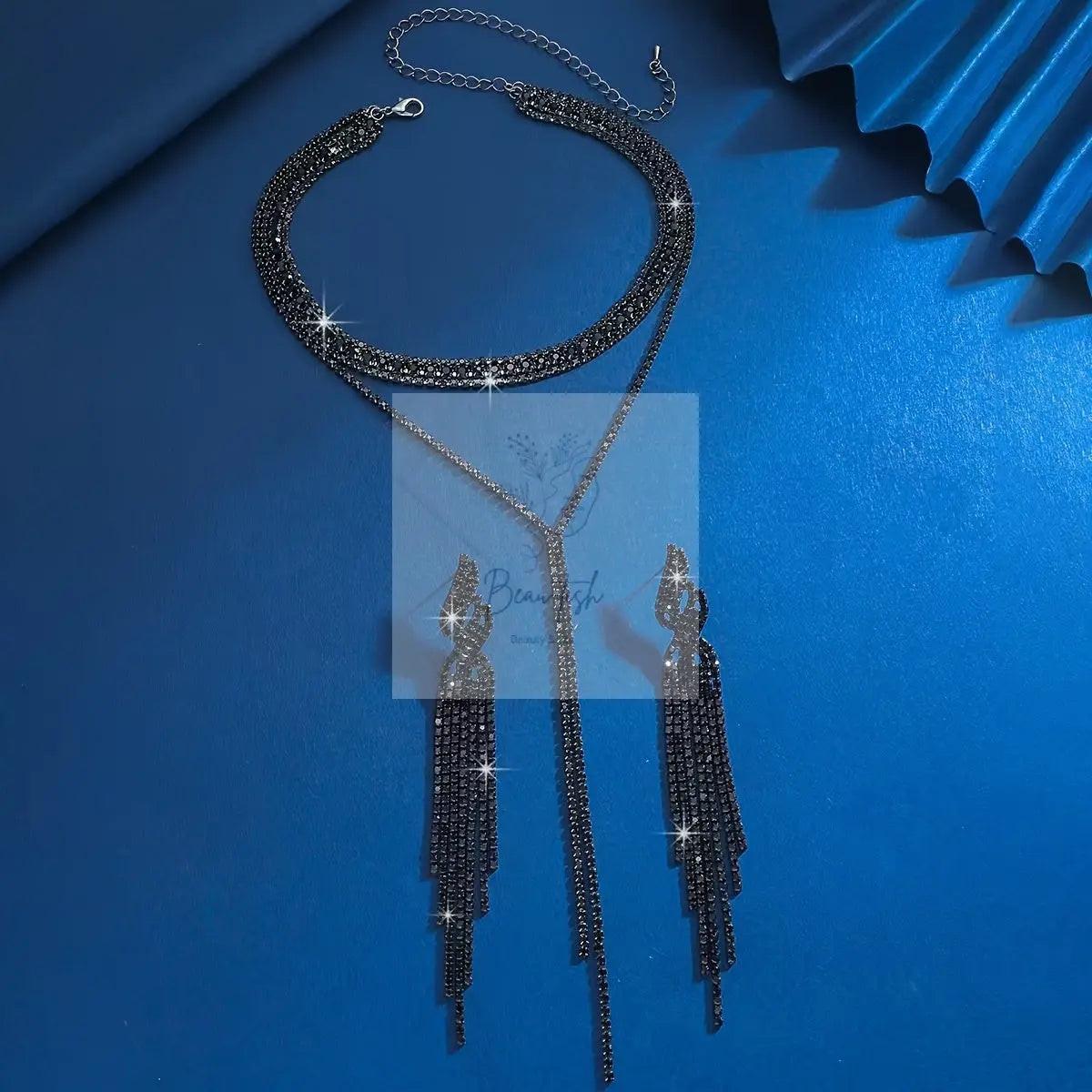 An Elegant And Luxurious Set of Black Earrings And Necklace