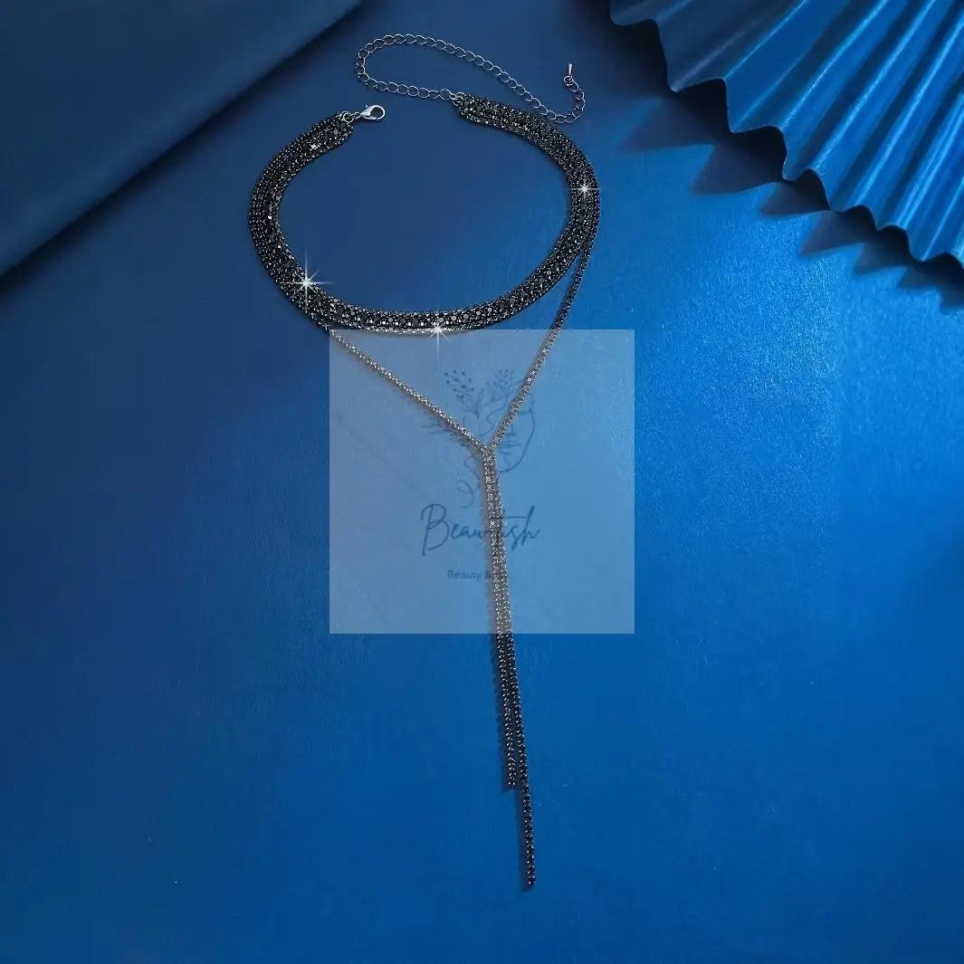 An Elegant And Luxurious Set of Black Earrings And Necklace