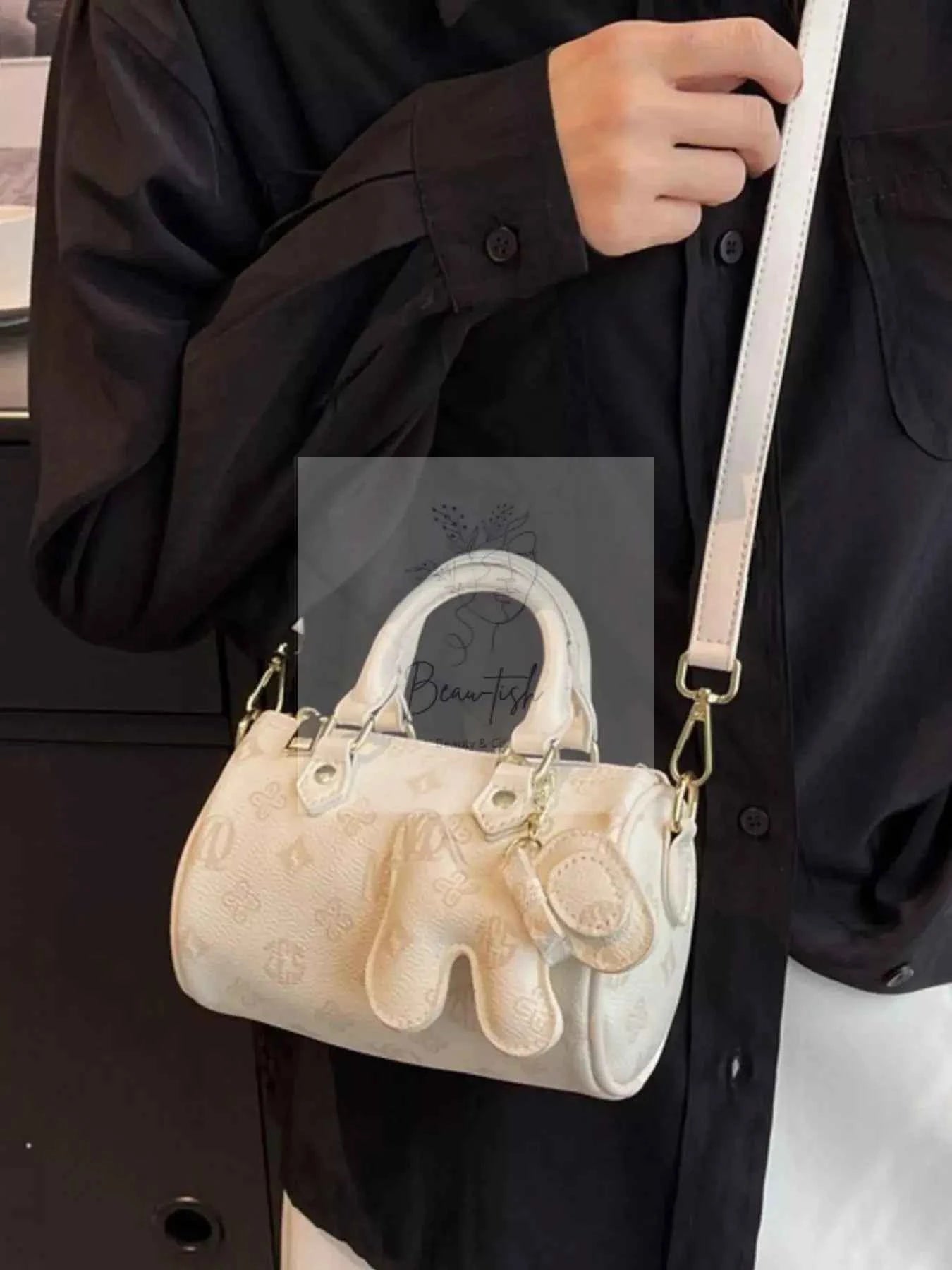 Barrel Crossbody Bag with Charm