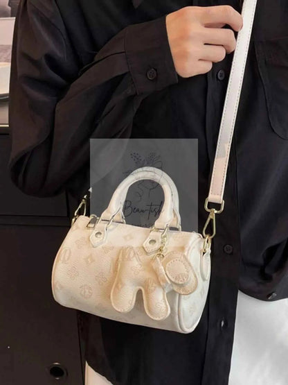 Barrel Crossbody Bag with Charm