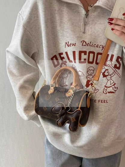 Barrel Crossbody Bag with Charm
