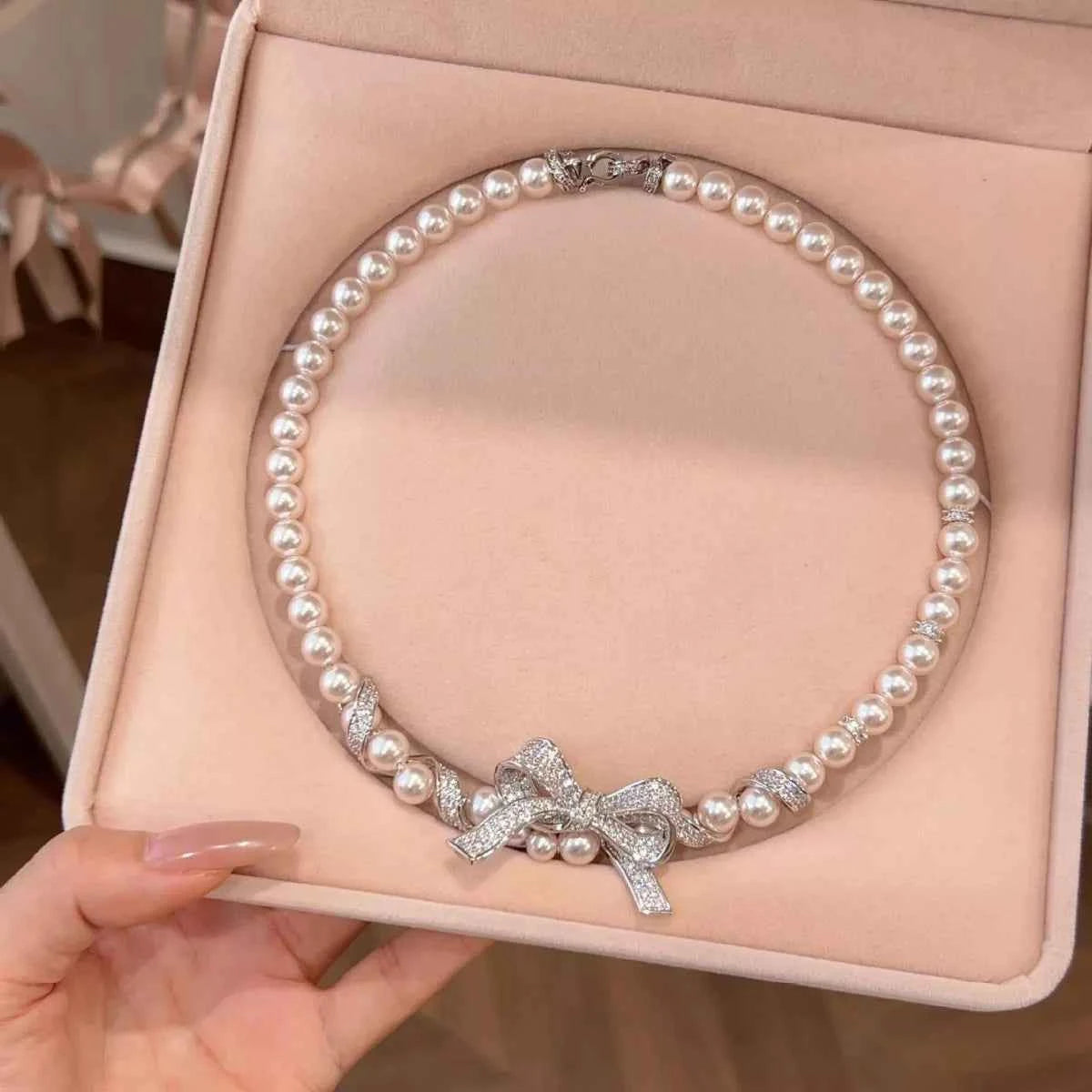 Pearl Necklace with Bow Pendant