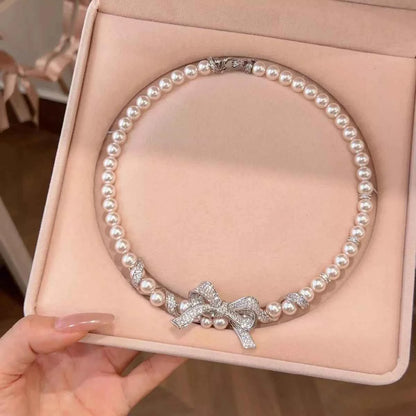 Pearl Necklace with Bow Pendant