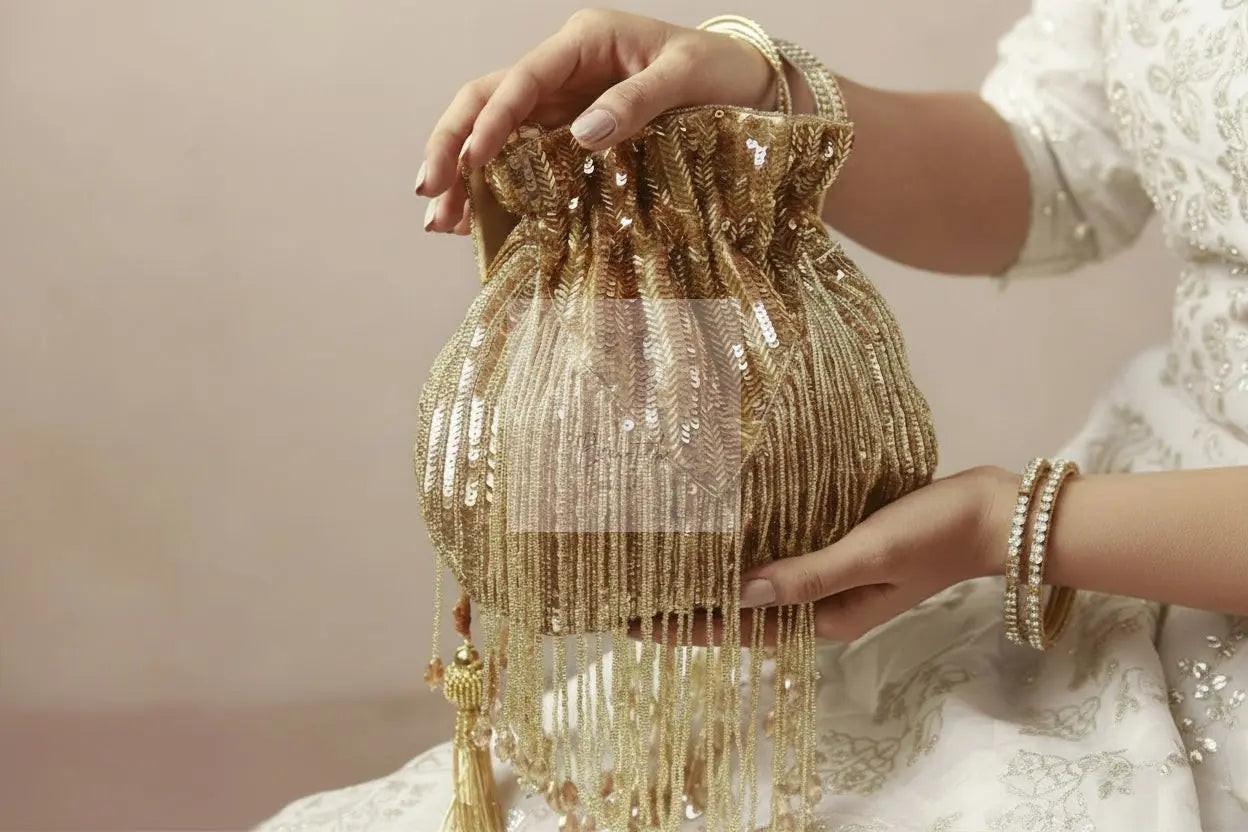 Gold Silk Tassles Potli (evening bag) With Handle