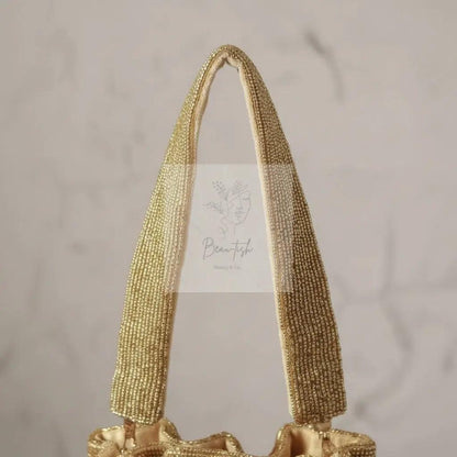 Gold Silk Tassles Potli (evening bag) With Handle