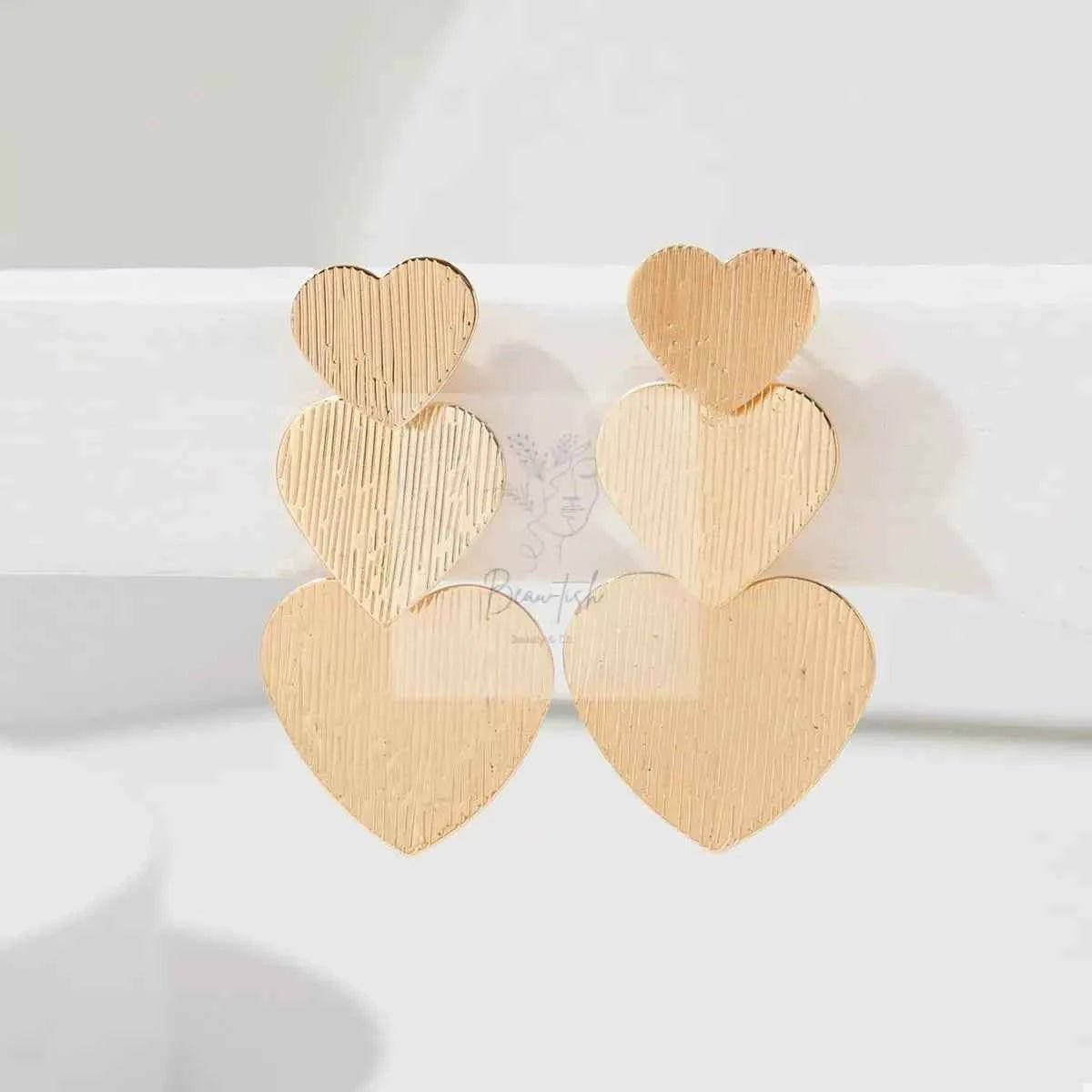Golden Heart Dangle Earrings
