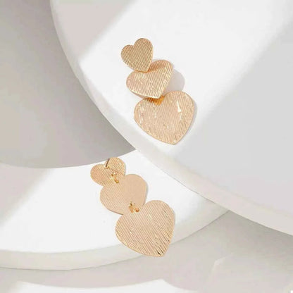 Golden Heart Dangle Earrings