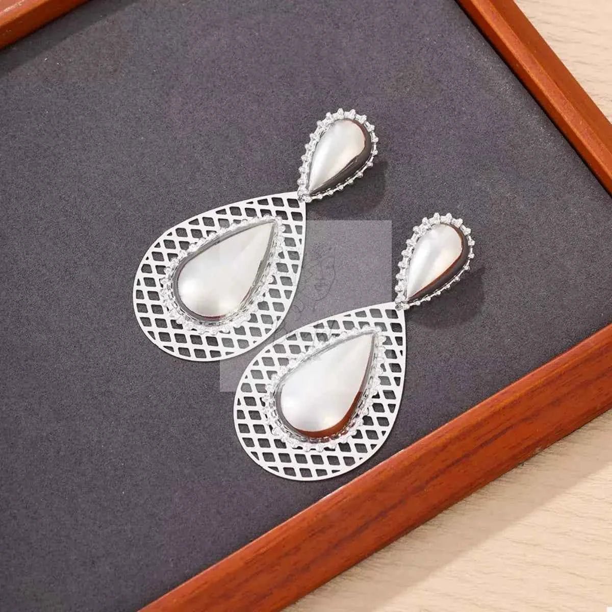 Hollowed - Out Teardrop Statement Earrings