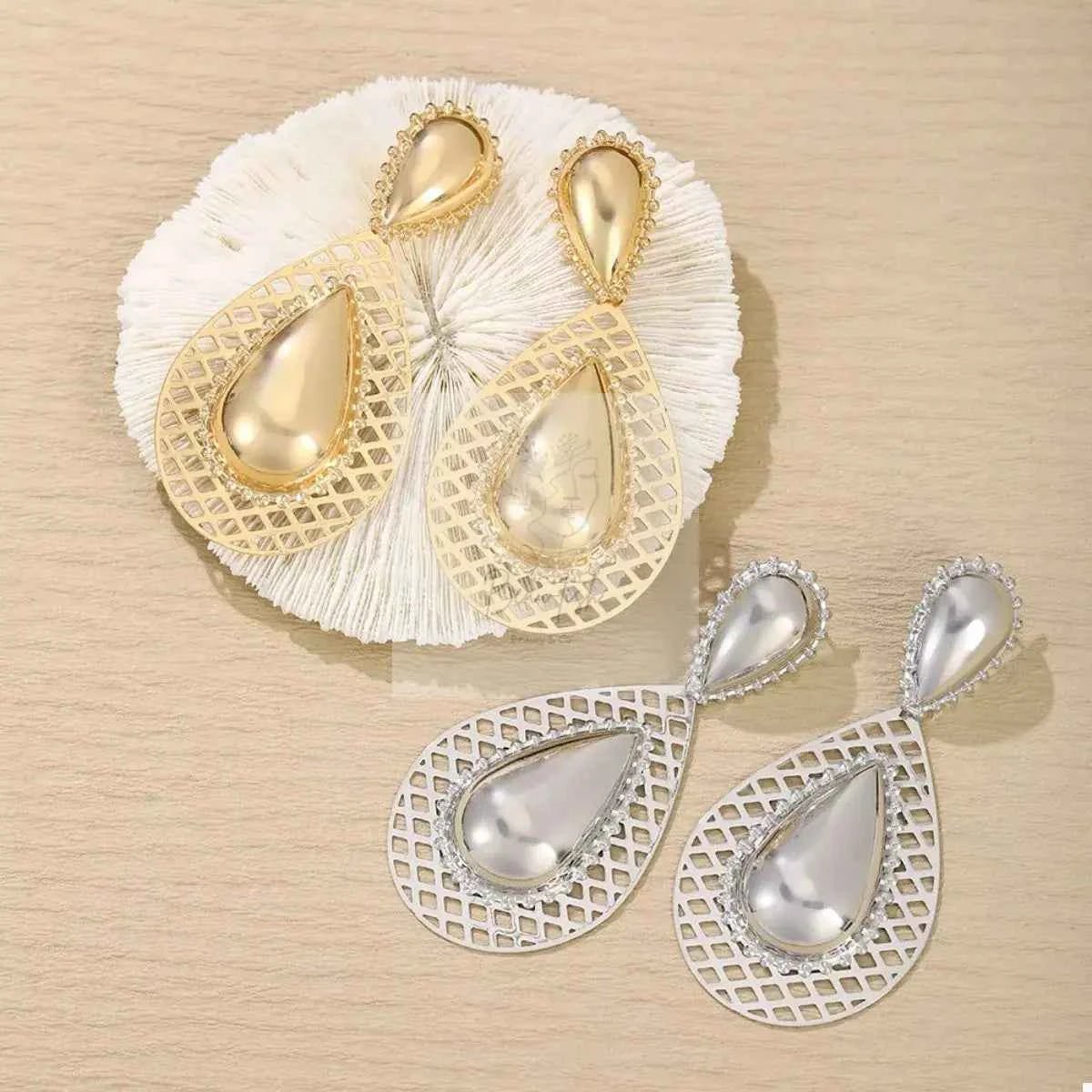 Hollowed - Out Teardrop Statement Earrings