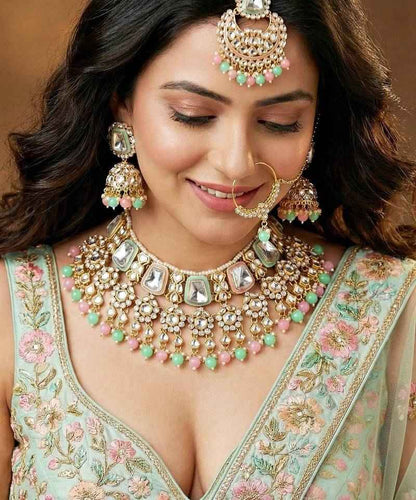 18 Kt Gold Plated Pink Mint Kundan Bridal Necklace Set with Tikka & Nath