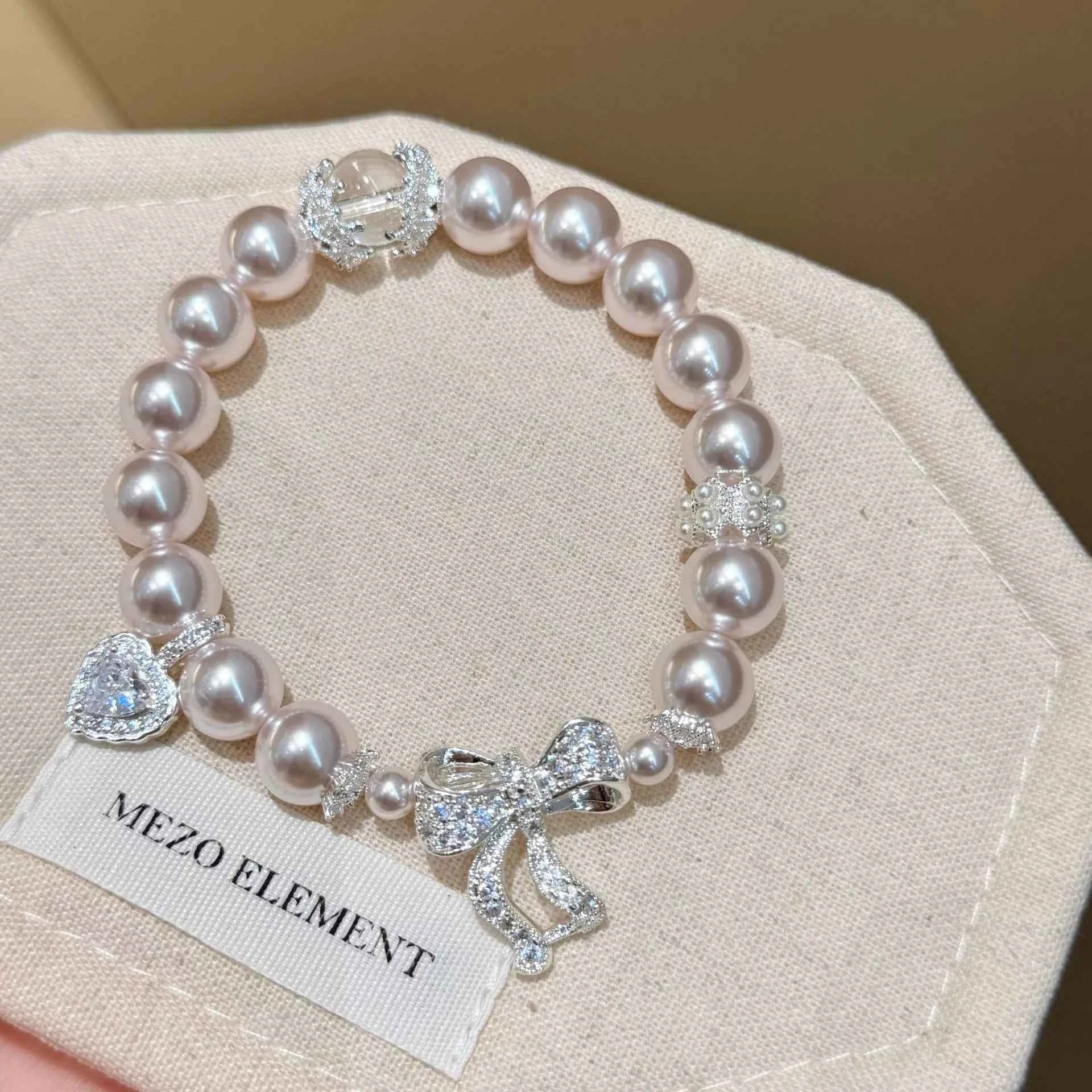 Pearl Bracelet with Bow Charm