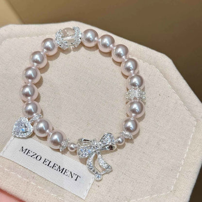 Pearl Bracelet with Bow Charm