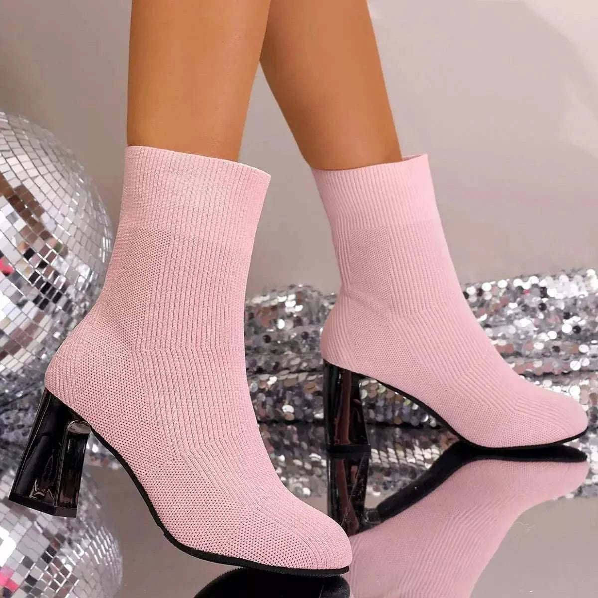 Round Toe Block Heels ankle boots in light pink mesh material with a ribbed pattern and shiny black block heels.