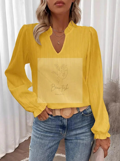 Ruffle Notched Long Sleeve Blouse
