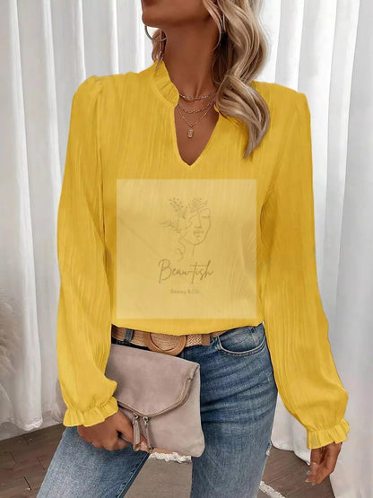 Ruffle Notched Long Sleeve Blouse