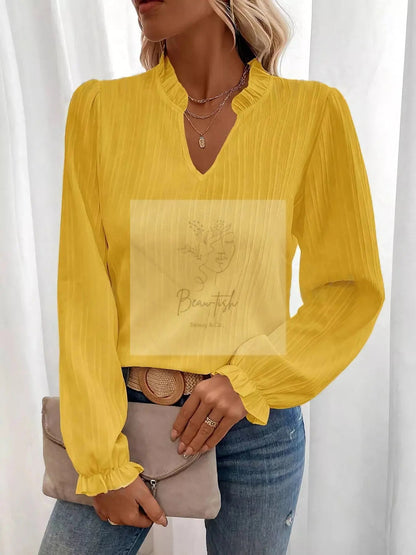 Ruffle Notched Long Sleeve Blouse